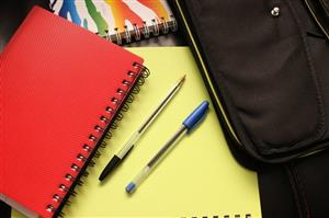 notebooks and pens 